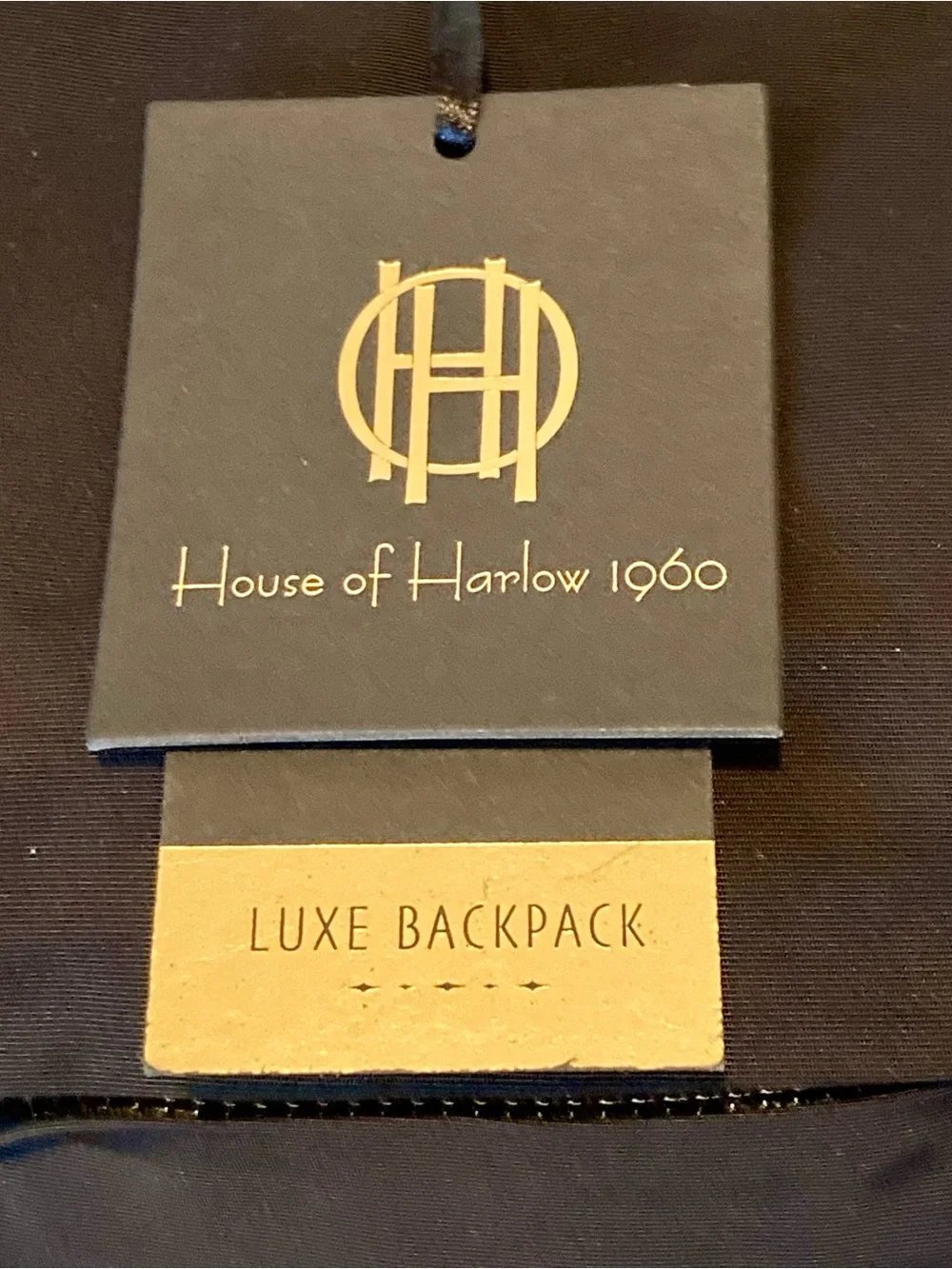 NWT House of Harlow nylon backpack in a classic black w/ silver-tone hardware